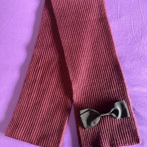 Kate Spade scarf. Burgundy with black bows. Gently used condition.